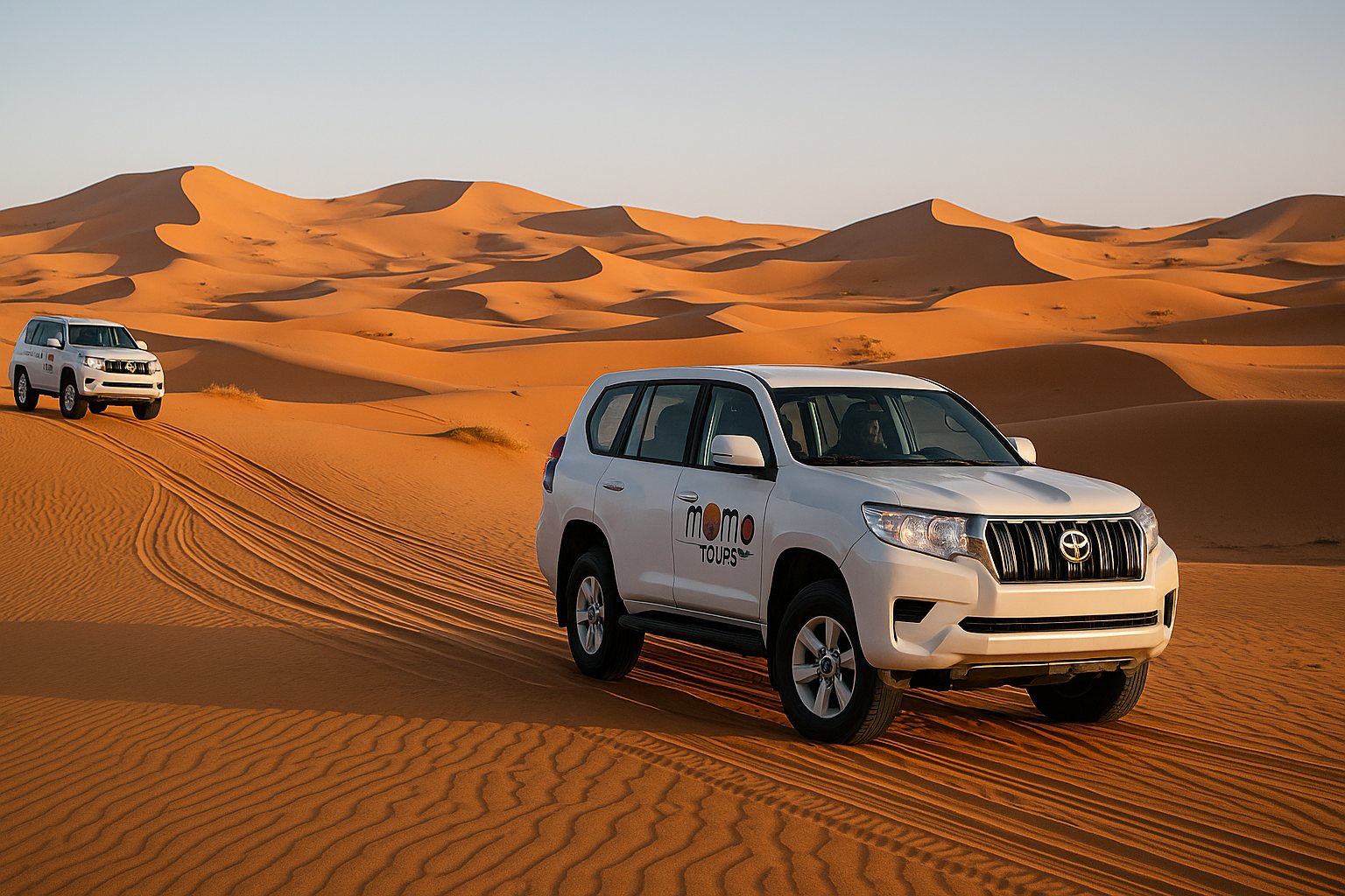 Momo Tours 4x4 vehicles crossing Sahara Desert Morocco